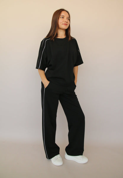 PANTALONE CON PIPING BIANCO