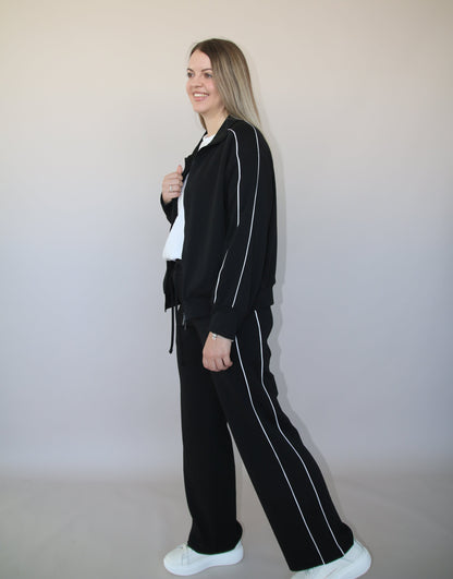 PANTALONE CON PIPING BIANCO