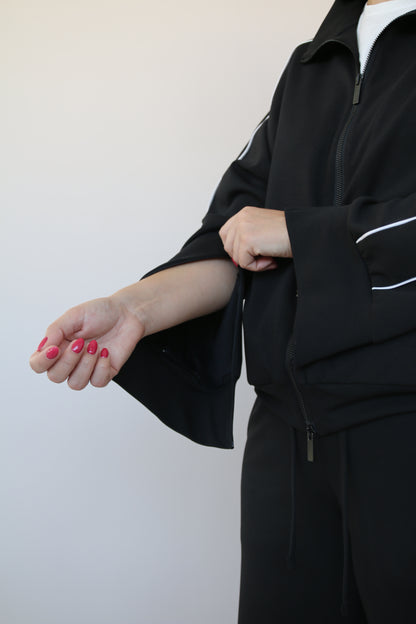 FELPA CON ZIP E PIPING BIANCO